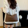 Bolsa de ombro, bolsa transversal e bolsa de mão de alta qualidade, com padrão de lichia, grande capacidade, nova moda outono 2026, simples, estilosa e versátil