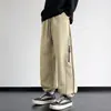 Novas calças casuais de trabalho de perna reta para primavera e outono para homens, apresentando um estilo americano moderno, corte solto, tamanhos grandes, design versátil e um visual sofisticado com pernas largas.
