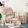 Nova mochila escolar xadrez fofa estilo japonês para meninas, mochila de campus da moda versão coreana conjunto de cinco peças, atacado