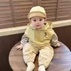 Chaqueta Falsa de Dos Piezas para Niños de Primavera y Otoño 2026 Nueva Elegante Sudadera con Capucha Rayada para Niños y Niñas
