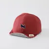 Sombrero de color sólido versátil para bebé con ala suave al por mayor nuevo sombrero solar transpirable para niño pequeño gorra de béisbol linda de cachorro para bebé