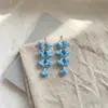 Brincos de Franja Flor de Lírio Super Fada Design de Nicho Simples Modernos Delicados Doces Versáteis Estilo de Férias para Mulheres