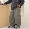 Novedad Otoño 2026 Pantalones Casuales Versátiles Sueltos para Niños Niños Grandes Bolsillo Cargo Casuales Modernos