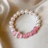 Pulsera de Perlas y Ojo de Gato Rosa para Mujer Dulce Diseño de Nicho Sentido de la Mano Cadena de Mano Temperamento Lujo Ligero Sensación de Alta Gama Joyería de Mano