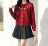 Outono/Inverno 2026 Novo Cardigã de Tricô com Gola Redonda e Laço Top Design Moderno Suéter Top Feminino