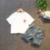 Traje europeo y americano transfronterizo para niños y niñas cuello redondo manga corta verano dibujos animados camiseta de bebé moda casual traje de dos piezas