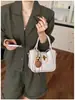 Bolsa de Mão Retrô de Nicho Feminina 2026 Primavera Novo Estilo Moda Tendência Bolsa Saco Casual para o Dia a Dia Ombro Único Transversal
