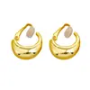 Anillo de Pigmento Dorado Estilo Europeo y Americano 2026 Sin Pinzas para Orejas para Mujer Nuevo Estilo Lujo Accesible Pendientes de Gama Alta Simples Versátiles Pendientes