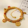 Atacado Wei Xue com o método antigo de areia dourada cinco caminhos deus da riqueza pulseira enrolada feminina maré nacional palavra de bênção moeda pulseira de significado