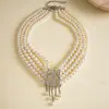 Collar de perlas en capas con cuentas transfronterizo europeo y americano, cadena para la clavícula estilo fiesta vintage, lujo ligero, accesorio versátil de alta gama para mujer
