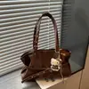 Bolso vintage de cuero encerado para mujer, gran capacidad, nuevo 2026 otoño e invierno casual de nicho, bolso de hombro o axila, bolso para el trabajo