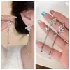 Nuevos aretes de borla de mariposa con incrustaciones de diamantes, ultralujosos y femeninos para mujer, a la moda, de lujo ligero, sensación de alta gama, versátiles para ir al trabajo, aretes de nicho