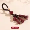 Al por mayor Mineral Crudo Natural Alto Contenido Cinabrio Oro Púrpura Torre Wen Chang Llavero de Bolígrafo Accesorios de Colgante para Bolsos Creativos Culturales Tendencia Nacional Más Vendidos
