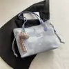 Bolsos de Gran Capacidad para Mujer Primavera y Verano 2026 Nueva Moda Bolso de Hombro para Viajes de Negocios Bolso Tote Cubo de Mano de Alto Valor