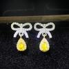 Brincos de diamante rosa super fada elegantes com laço online celebridade luxo grupo incrustado gota d'água em forma de pêra diamante colorido brincos de zircônia amarela