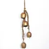 Cuerda de cáñamo Campana de cascabel Decoración navideña Adorno colgante Trompeta de metal de boca abierta Decoración de campana Campana navideña personalizada Decoración de puerta