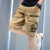 Pantalones Cortos Hombre Algodón Shorts de Playa Pantalones Casuales Hombre Shorts de Camuflaje Pantalones de Verano para Estudiantes Pantalones de Moda con Múltiples Bolsillos