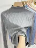 Camiseta de punto para mujer con cuello medio alto, modelo otoño e invierno 2026, color albaricoque, manga larga, top básico ajustado