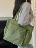 Bolsa de mano Shuai Mi Jia de gran capacidad 2026 nueva de moda bolso de mano simple moda femenina bolso de hombro casual