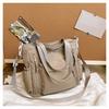 Bolsa de Grande Capacidade Feminina 2024 Nova Bolsa Leve Ombro Crossbody Estudantes Universitários Japoneses Bolsa de Viagem Multi-funcional Casual