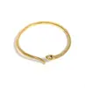 Aretes pulsera anillo de serpiente para mujer chapado en oro al vacío joyería de nicho ins europea y americana joyería de celebridad de internet de lujo ligero ins