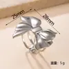 Nuevo anillo de acero inoxidable transfronterizo, moderno y único anillo de mariposa prensado en aceite para mujer, anillo de diseño geométrico que no se decolora