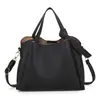 Bolsas de Cuero Suave Nuevas Otoño/Invierno 2025 Bolso Cubo de Alta Gama Moderno Gran Capacidad Bolso de Mano para Viajes Diarios Bolso de Hombro