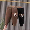 Pantalones de invierno estilo western de algodón para niños y niñas, nuevos y guapos, pantalones de algodón con cabeza de perro tridimensional para bebé