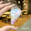Llavero creativo de piruleta rellena de aceite con arena líquida, colgante flotante de helado, colgante para bolsa al por mayor, decoración linda