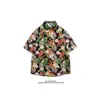 Camisa Floral Tropical Estilo Sudeste Asiático Camisa Floral de Manga Curta Tendência Masculina e Feminina Casaco Versátil Traje de Praia de Meia Manga