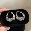 Elegante HerederaEstilo Fresco Bolso de Lunares Plateados Arete Arete Único Mujer 2026 Aretes Súper Hermosos