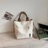 Bolsa de Lona Grande Capacidade para Mulheres 2026 Nova Verão Estudante Universitário Bolsa Tote para Ir à Aula Bolsa de Ombro Único Transversal