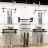 Estante de exhibición para tienda de ropa Pared para ropa de hombre y mujer Estante Vintage Perchero de pared para ropa infantil perchero estante de exhibición