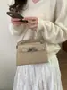 Bolso de Mano con Patrón de Cocodrilo para Mujer 2026 Nueva Moda Simple Textura de Alta Gama Bolso Tipo Kelly Elegante Bolso de Hombro Cruzado