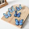Artesanía de Seda de Mariposa Simulada Decoración de Interiores Accesorios para Fotografía Flores Falsas Decoración de Bodas Flores de Mariposa Creativas Venta al por Mayor