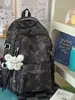 Mochila nueva tie-dye, mochila de nicho de alto valor, mochila estudiantil de gran capacidad, mochila estudiantil de bloques de color