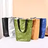 Bolsa de papel Dupont con logo personalizado, bolsa de lona vintage, bolsa de hombro de papel kraft lavable para compras, en stock