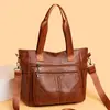 Bolso de mujer de gran capacidad 2026 nuevo modelo bolso de hombro bolso de mano tipo tote vintage para el trabajo bolso cruzado con múltiples compartimentos