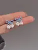 Brincos s925 Estilo Coreano Novos Vazados Borboleta Flores Pérola Aglomerados Femininos Frescos Doces Delicados Moda Versátil