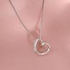 Collar de amor con diamantes de destello irregular para mujer, moda ligera, lujosa, elegante, diseño de nicho, estilo sencillo, cadena de clavícula dulce.