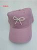 Gorra de béisbol estilo coreano para mujer, diseño de nicho, dulce, combinable con todo, con lazo de perla, suave y sencilla.