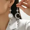 Pendientes y Collar Bohemios Europeos y Americanos con Borlas de Estrella Solar Ráfaga Oro Envejecido Retro Accesorios de Vacaciones de Nicho