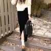 Nueva colección Otoño/Invierno 2026: Falda midi de terciopelo de alta gama para mujer, moderna y elegante, con un diseño retro, caída lujosa y una silueta gruesa y larga
