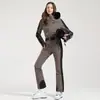 Nuevo traje de esquí de una pieza profesional para mujer para esquí al aire libre con doble tabla, a prueba de viento, cálido, impermeable, ajustado, alta elasticidad, traje de esquí transfronterizo para mujer