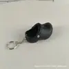 Directo de fábrica nuevos mini pantuflas zapatos con agujeros pequeños colgante de zapatos llavero de zapatos pequeños adornos para mochila comercio exterior transfronterizo