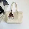 Bolsa de mano de alta calidad para mujer, gran capacidad, estilo coreano, con detalle de cinta, vintage y a la moda, adecuada para ir al trabajo, bolso de hombro, bolsa de cuero PU de calidad de exportación