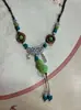 Collar con colgante de campana de mariposa de cerámica de estilo étnico retro para mujer, diseño nuevo y moderno, cadena larga para suéter, accesorios