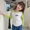Camiseta Básica de Cuello Redondo para Niñas Moda Primavera y Otoño 2026 Manga Larga Popular para Niños y Bebés con Dobladillo Curvo
