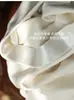 Falda midi elegante de acetato y lana estilo francés Yunshuyaxu, de cintura alta, línea A, que cubre la cadera, adelgazante y fluida para el trabajo
