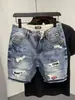 Shorts de mezclilla rasgados para hombre con parche único de orejas de gato desgastadas, corte recto holgado, marca de moda, tallas grandes, shorts hasta la rodilla